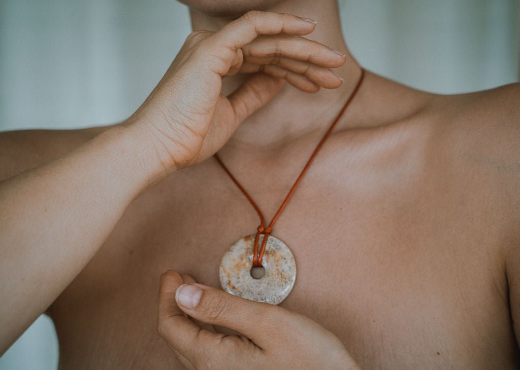 Woman wearing green agate necklace