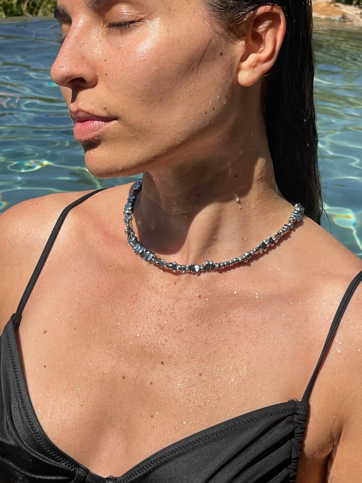 Woman wearing hematite necklace