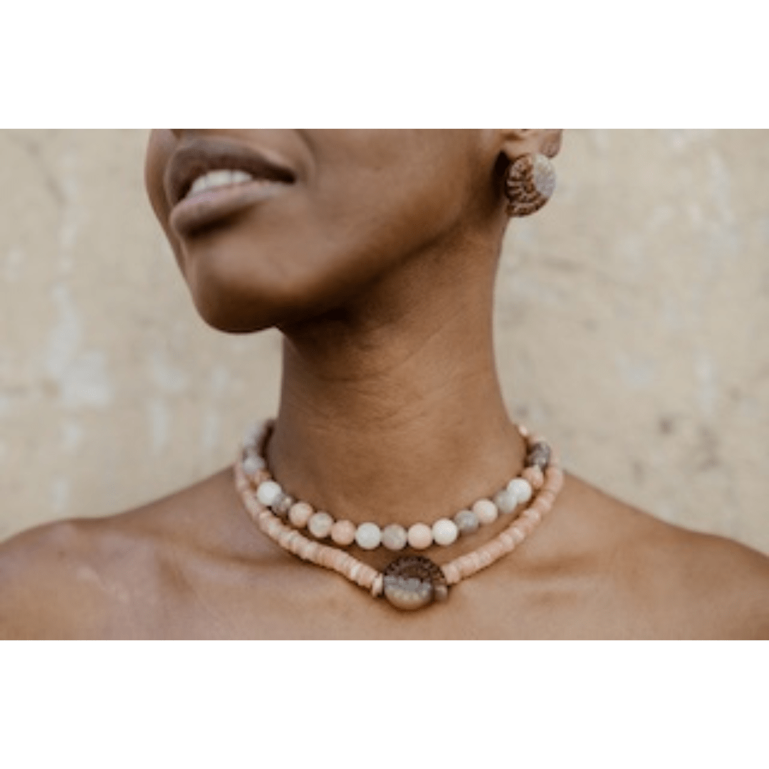 Moonstone and Sunstone necklace worn on neck close-up