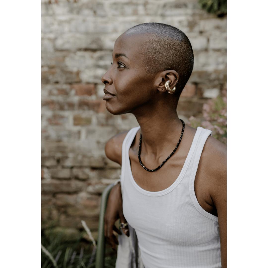 Woman wearing Black Spinel necklace lifestyle shot