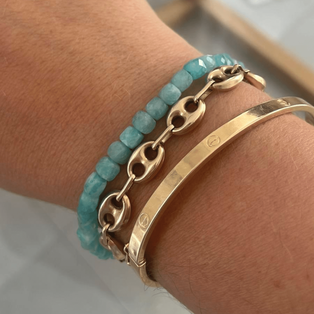 woman wearing amazonite bracelet minimal style