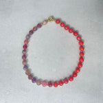 Red jade and pink fire agate necklace with gold details