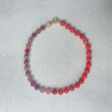 Red jade and pink fire agate necklace with gold details